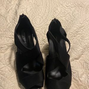 Black satin peep toe heel.  Retro 50’s style.  Very comfortable